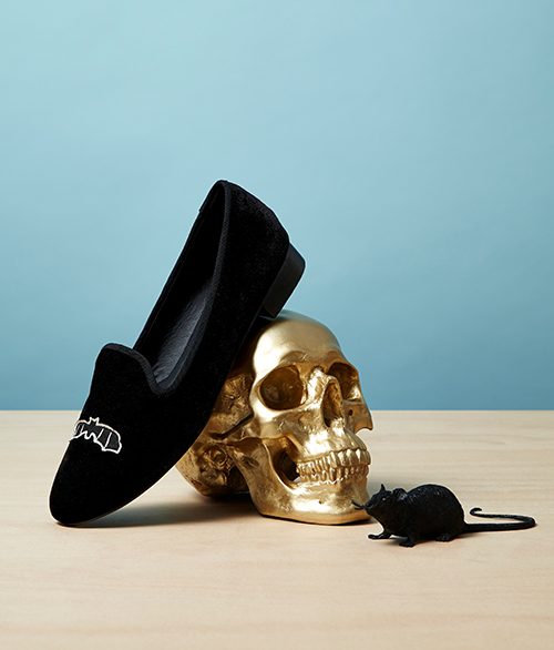 Art direction for Asos Halloween campaign. Bat suede slipper shoe resting on gold skull