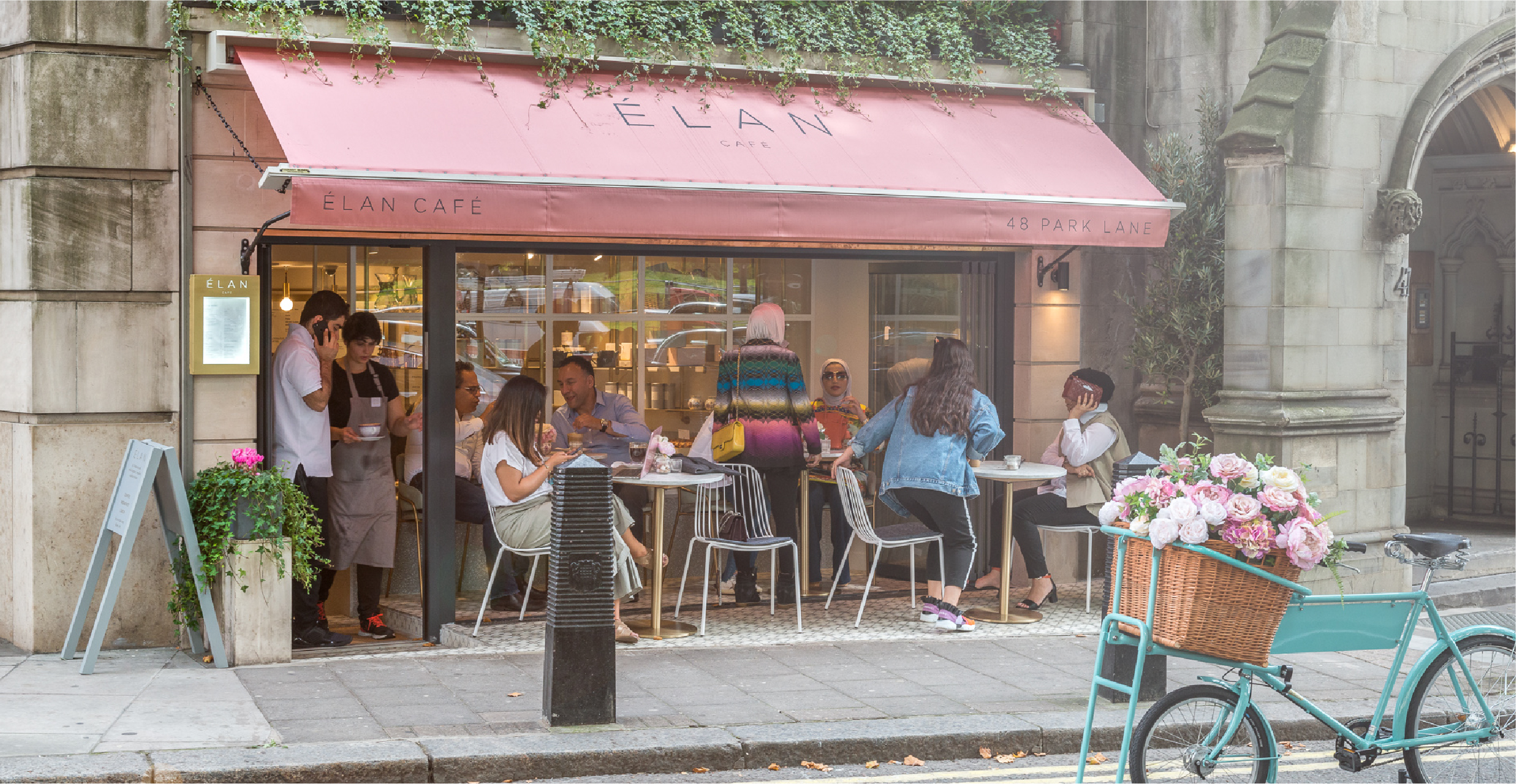 Shot of the outside of Elan on a busy day in Mayfair